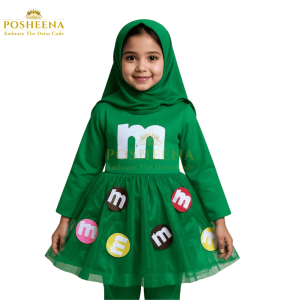 Girl wearing green M&M costume for girls – candy-themed kids costume in Pakistan with hijab and colorful printed dress