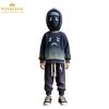 Sad emotion kids costume with expressive face print, hood, and thundercloud lightning prop – custom school outfit by Posheena Pakistan